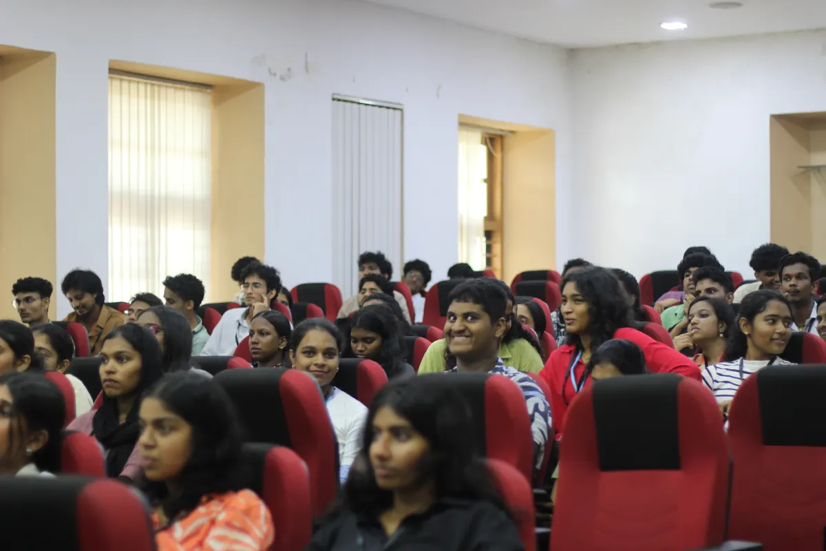 The audience seen from the front of the auditorium, seats filled